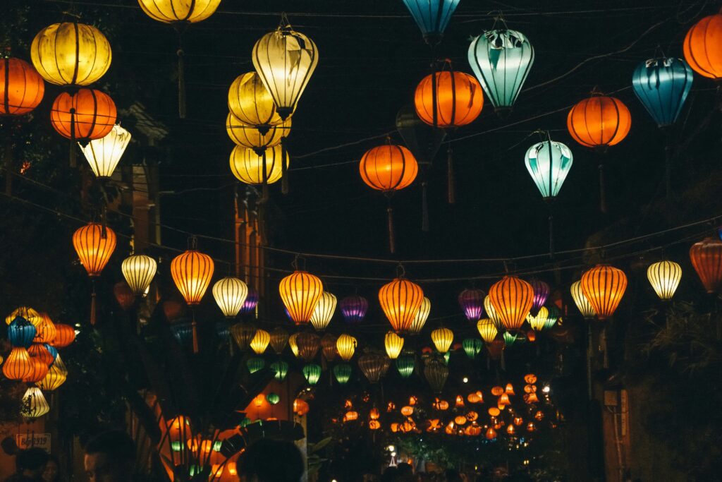 Hoi An ancient town with colorful lanterns at night.