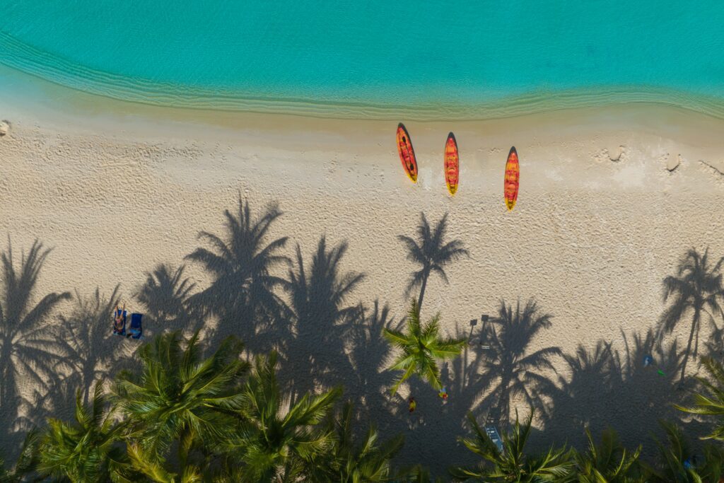 Explore Vietnam travel at Kem Beach in Phu Quoc with white sand and turquoise water.